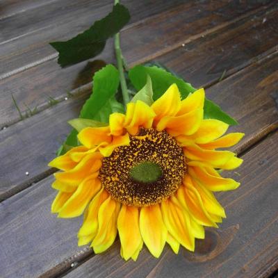 Simulated single sunflower with stem